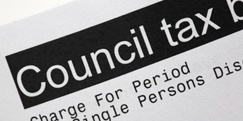 A close up of a printed council tax bill, showing the heading Council tax bill above the lines Charge For Period and Single Persons Discount.